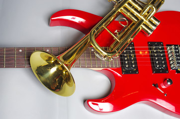 Obraz na płótnie Canvas Trumpet and electric guitar