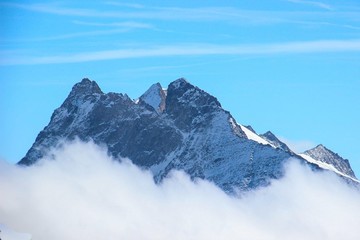 Fototapeta na wymiar Leaning Peak in The Clouds
