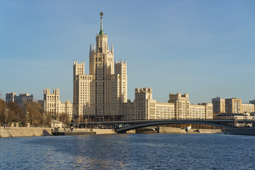 Fototapeta na wymiar Moscow city image at the winter day. Stalin era houses in the Kotelnicheskaya embankment image. 