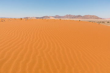 African landscape, beautiful red sand dunes and nature of Namib desert, Sossusvlei, Namibia, South Africa