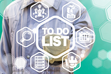 Industry worker uses on a virtual screen of the future and touches the inscription: TO DO LIST. To do list manufacture concept. Orginizer and industrial planning.