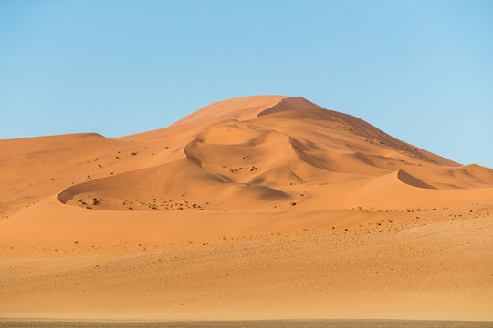 African landscape, beautiful red sand dunes and nature of Namib desert, Sossusvlei, Namibia, South Africa