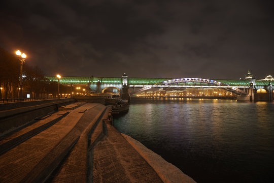 Park Gorkogo in Moscow (Gorky park) at night winter time. Andreevsky pedestrian bridge image.