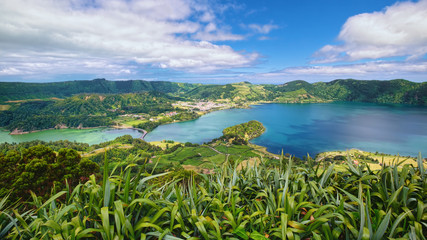 Lagoa Verde and Lagoa Azul, two connected lakes in wide volcanic caldera called Sete Cidades,...