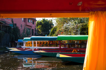 Boats Framed through Window of Another Boat at Xochimilco in Mexico City