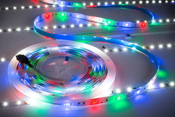 RGB LED light strip on white table plate background