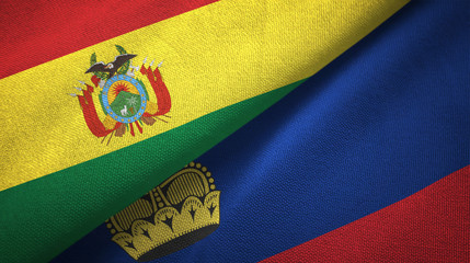 Fototapeta premium Bolivia and Liechtenstein two flags textile cloth, fabric texture