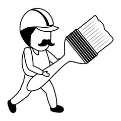 worker holding brush tool