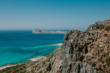 Beautiful view on blue lagoon and gramvousa island from behind rocks. Greece island, crete,...