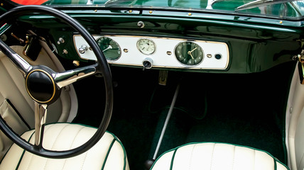 Obraz premium Top view of vintage retro car dashboard