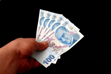 100 Turkish Lira banknote, black background