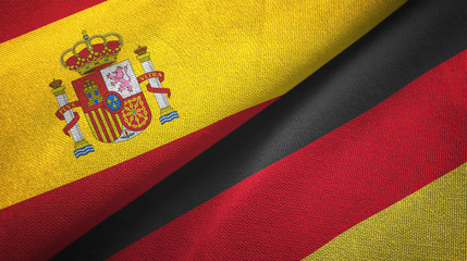 Spain and Germany two flags textile cloth, fabric texture
