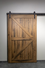 Vintage sliding door with open ferrous metal fittings