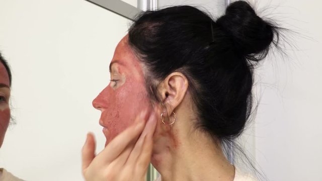 Female taking care of skin condition