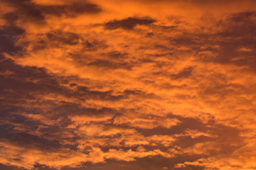  orange dark clouds at sunset