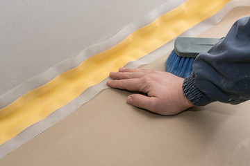 measuring the length of the watertight band, sealing tape, the procedure for waterproofing works