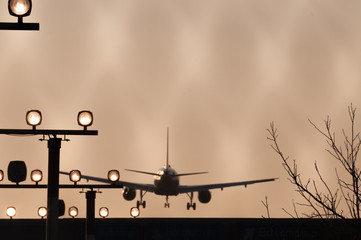 landing airplane at airport tegel in the afternoon 1