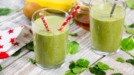 Green smoothie with celery, spinach, kiwi, banana and milk - Image