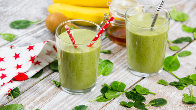Green smoothie with celery, spinach, kiwi, banana and milk - Image