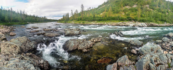 The rapids on the northern taiga river.