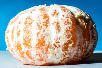 macro shot of juicy yellow mandarin for the whole frame