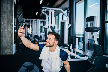 Smiling selfie at the gym.