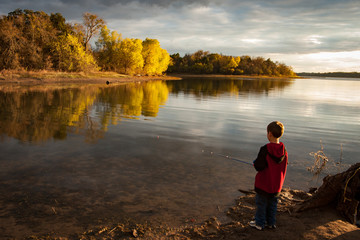 Boy fishing on Ray Roberts Lake, Texas