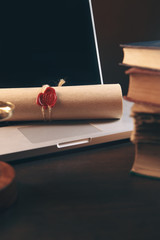 justice and law concept. Lawyer workplace with laptop and documents with dark wooden. Notary's...