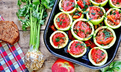 Zucchini stuffed with minced meat, rice and tomatoes. Ready for eat.