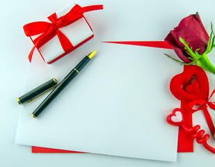 International Women's Day, March 8. Red white cards with pen and decorative items, roses, hearts,...