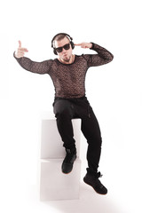 stylish modern guy with headphones listening to music.isolated on white