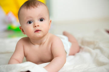 infant baby boy crawl with towel