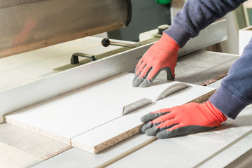 Male carpenter working in his carpentry workshop.