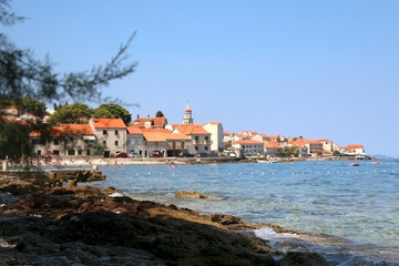 Fototapeta na wymiar Beach in the small town Sutivan, island Brac, Croatia. Sutivan is popular summer travel destination.