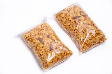 triditional indian pakistani snacks nimko in plastic packing bags