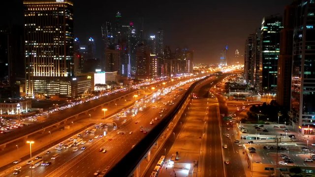 Aerial hyperlapse of a busy highway in Dubai at night, U.A.E.