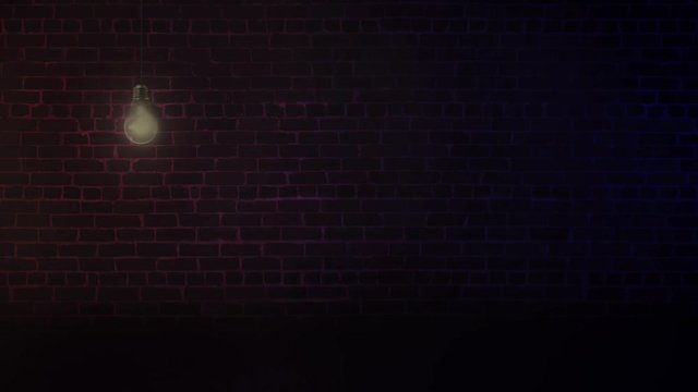Brick Wall Blue and Red Lights with Bulb 4K Loop features a flickering light bulb swinging in front of a brick wall with flashing red and blue lights in a loop