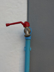 faucet and two tone background