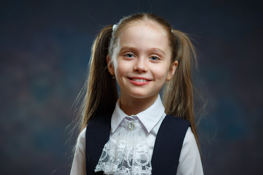 Smiling Caucasian Elementary Schoolgirl Portrait