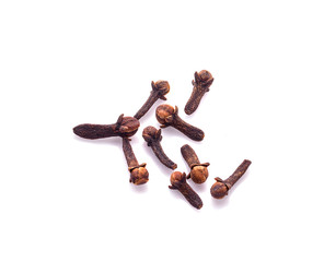 dry cloves on white background