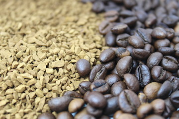 Roasted coffee beans tipped over on white glass