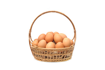 eggs in a basket isolated on white