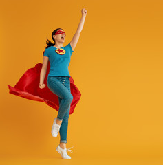 woman in superhero costume - obrazy, fototapety, plakaty