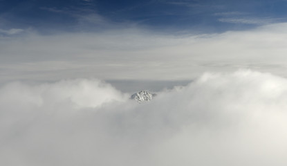 Obraz na płótnie Canvas Oetztal valley in the winter,austrian alps. Clouds and blue sky.