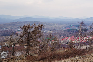 country landscape. Top view of the bungalows and the mountains