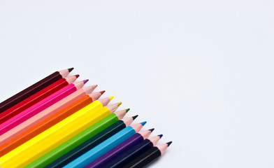Colour pencils on white background