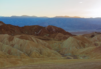 Landscape of Death Valley National Park at Zabriskie Point at Sunset. Erosional landscape in California, USA. Beautiful View of Death Valley National Park.