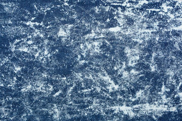 Shabby denim texture for background. Blue jeans 