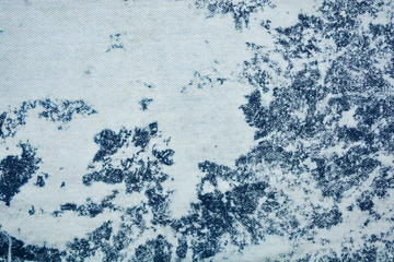 Shabby denim texture for background. Blue jeans 