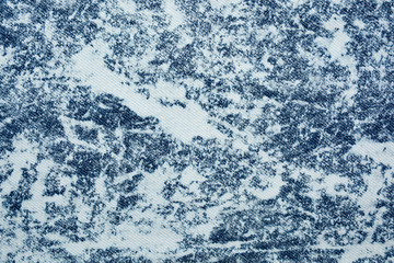 Shabby denim texture for background. Blue jeans 
